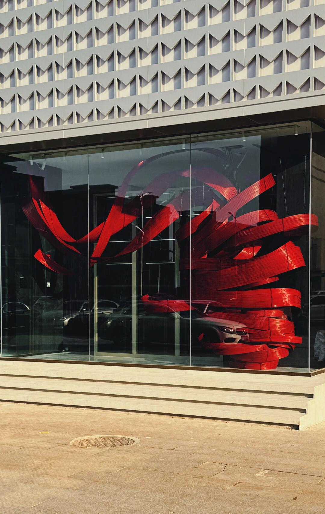 A Stroke of Deep Chinese Red Facing the Street | Bamboo Art Installation image 2